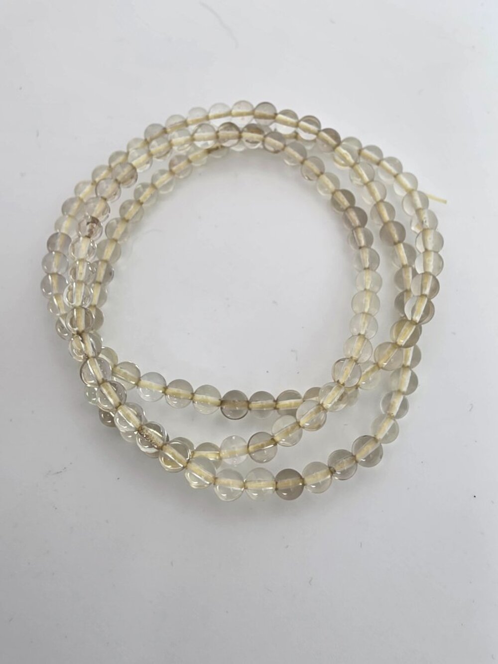 Delicate 22 in Citrine triple wrap bracelet with 4.5 mm translucent champagne an